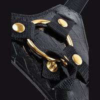 "Designer" strap-on vyö